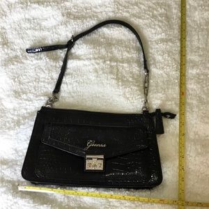 Patten faux snake/alligator hand bag.